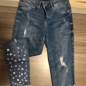 Jean pants with hand made accessories